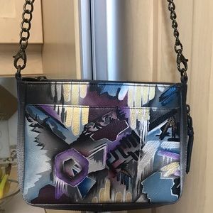 Anushka compact crossbody with front pocket.  NWOT